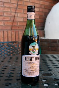 Fill 1/3rd glass with Fernet, top off with Coke and ice, and you're half Cordobese