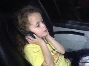 Molly enjoying her own video screen on Andesmar bus lines.